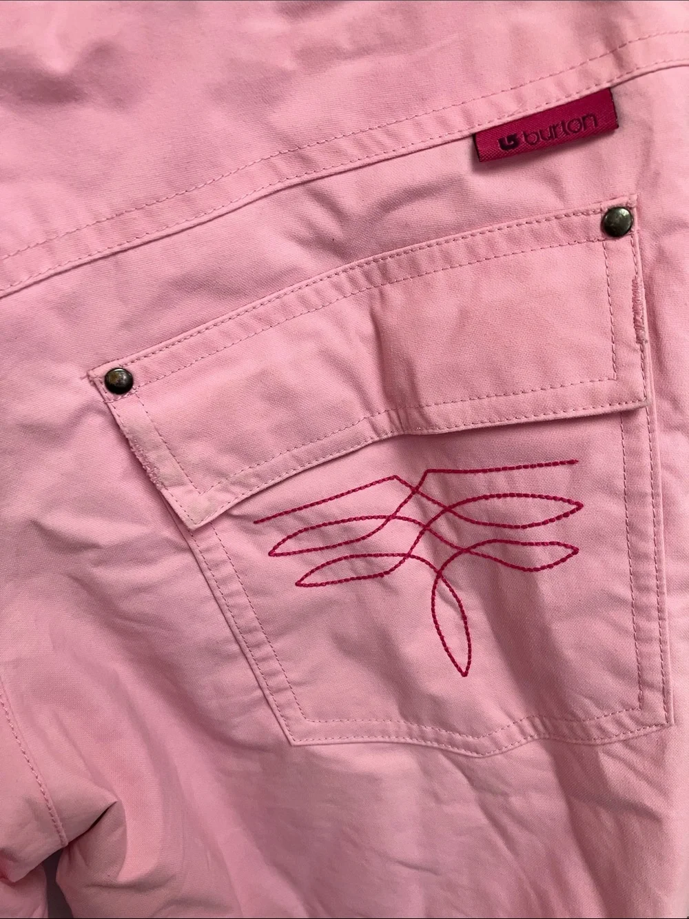Kids Burton pink snowboard pants size L.